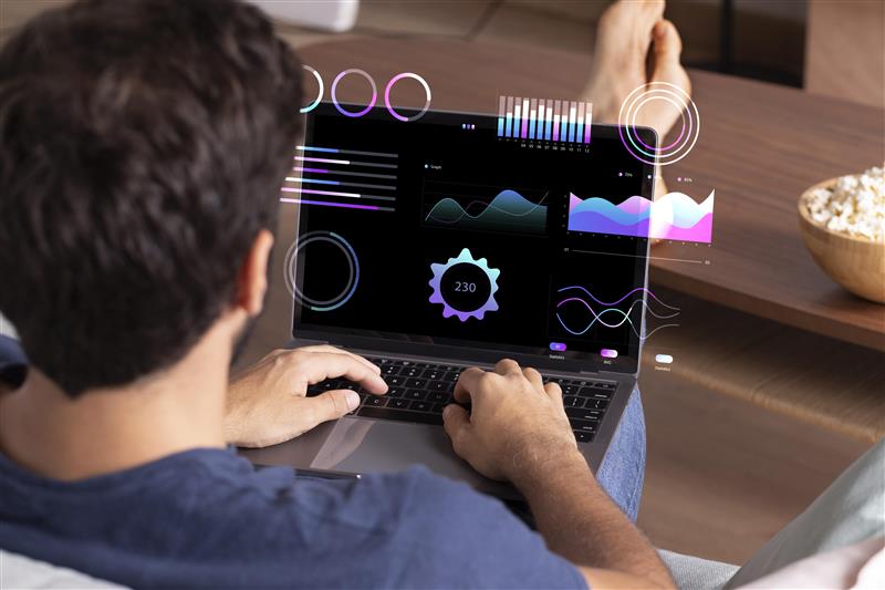 A Power Apps Developer working on laptop developing Power platform Apps - Hire Socium's expert Power Apps Developers Today!