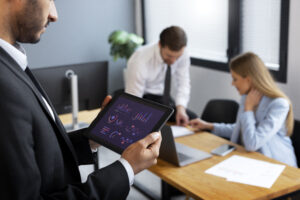 Person in a bank looking at dashboards - to show Power BI in banking/finance industry