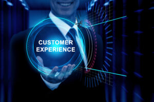 Man holding Digital globe showing Customer Experience with Salesforce